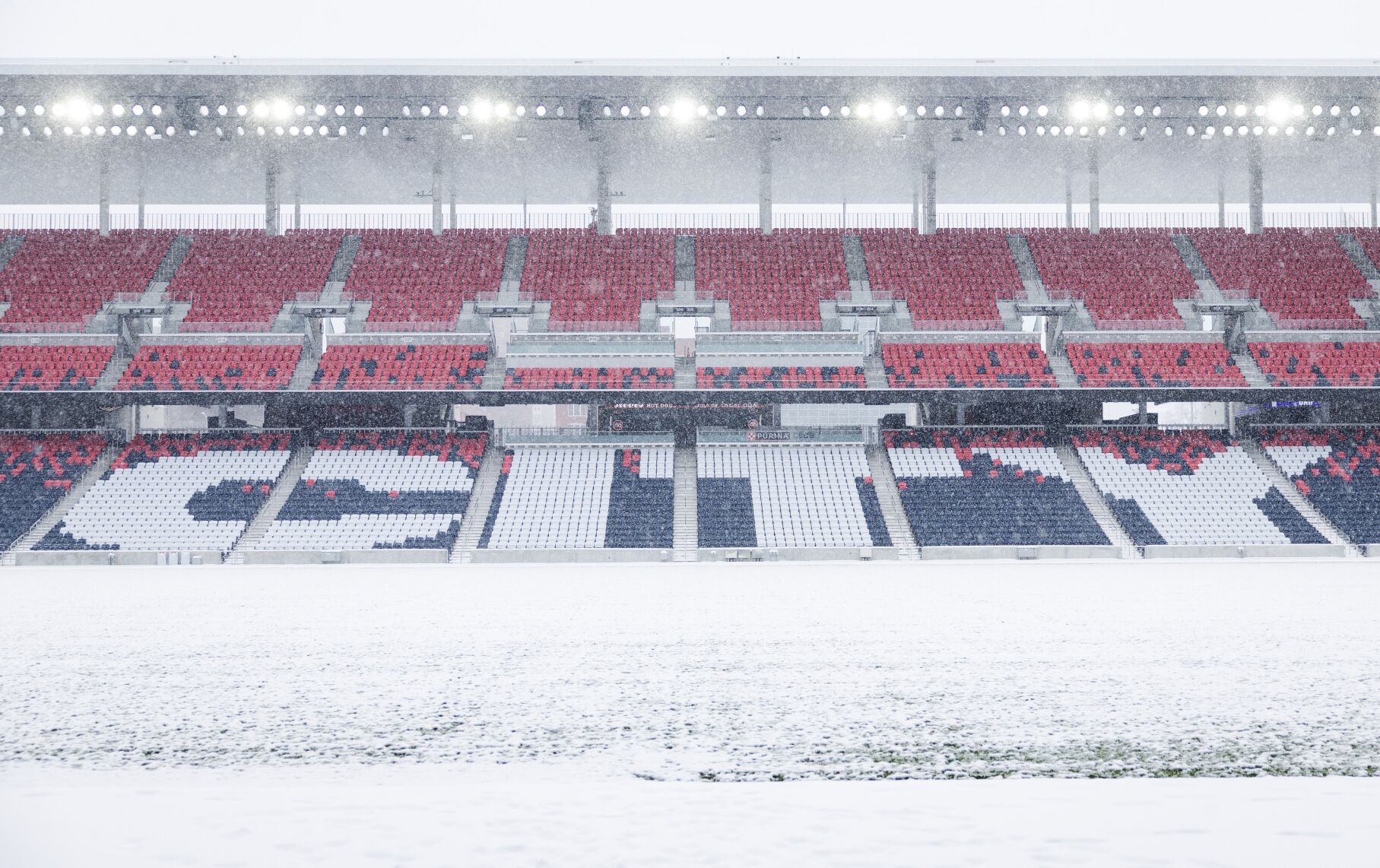 Snow falls at Energizer Park